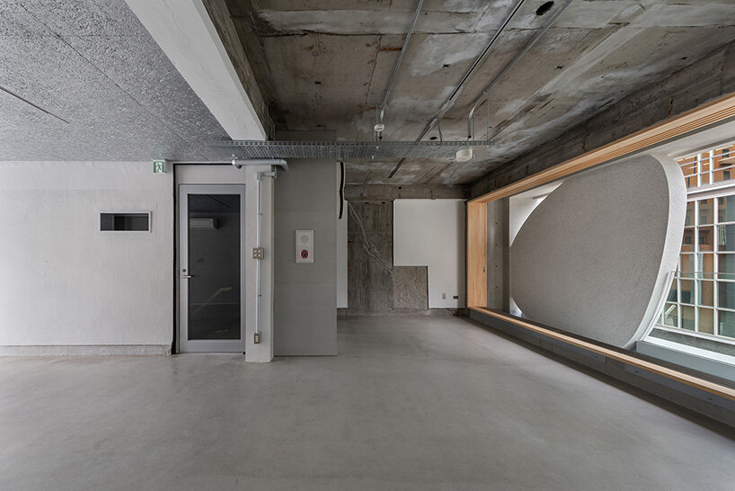 sculptural ovals shape seismic retrofit of 50-year-old building in japan by C+A