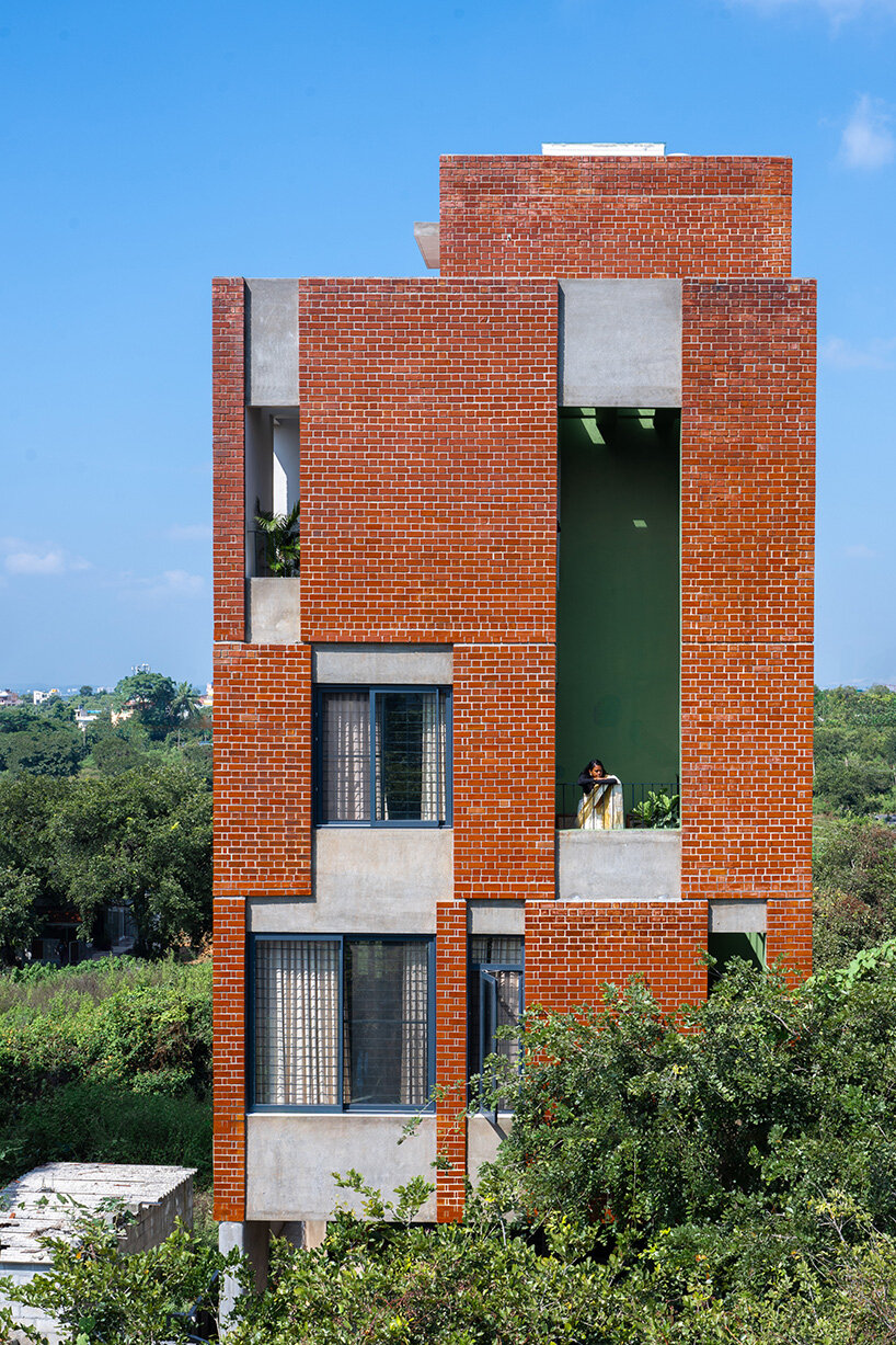 studio ShoulderTap contrasts brick and stone to shape family residence in india