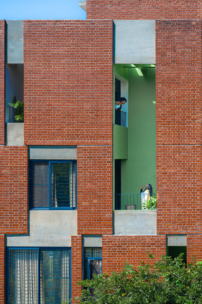 studio ShoulderTap contrasts brick and stone to shape family residence in india