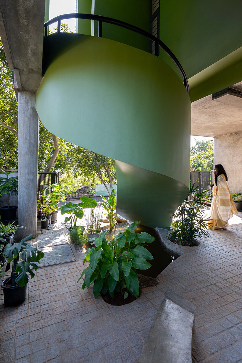 studio ShoulderTap contrasts brick and stone to shape family residence in india