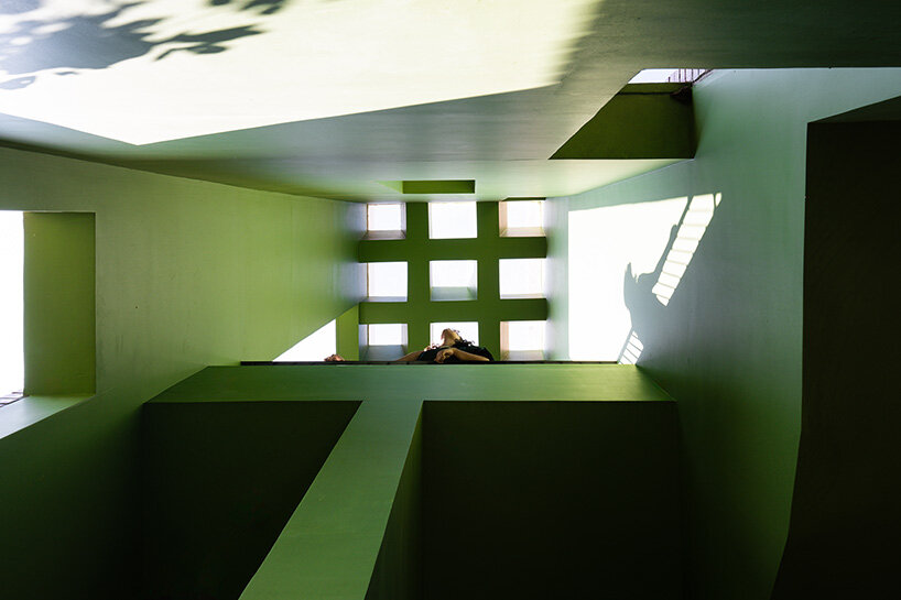 studio ShoulderTap contrasts brick and stone to shape family residence in india