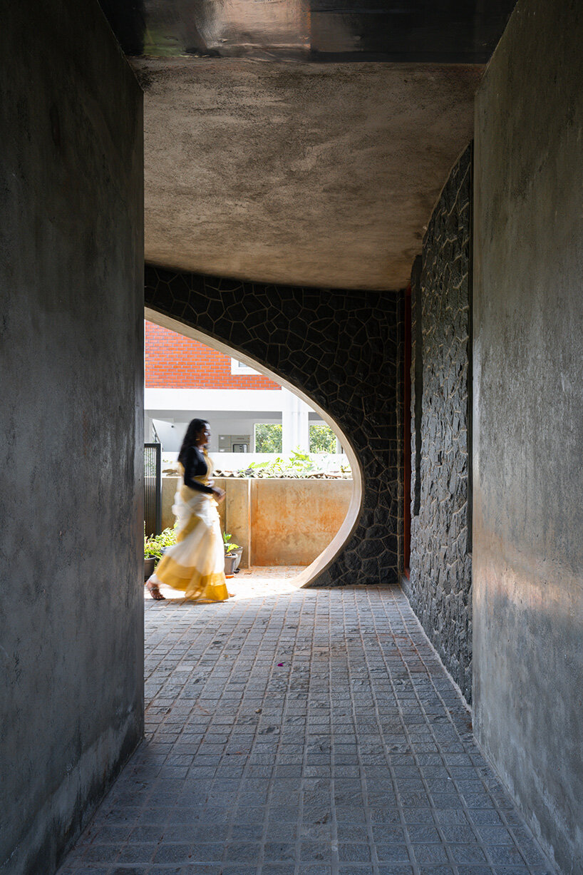 studio ShoulderTap contrasts brick and stone to shape family residence in india