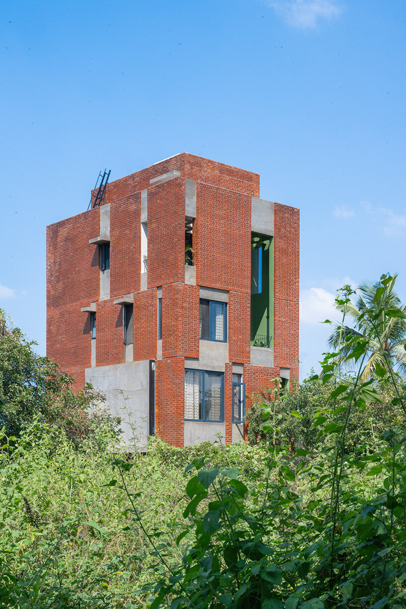 studio ShoulderTap contrasts brick and stone to shape family residence in india