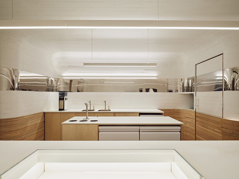 selgascano and curtis su envelop % arabica new york café in handcrafted timber cocoon