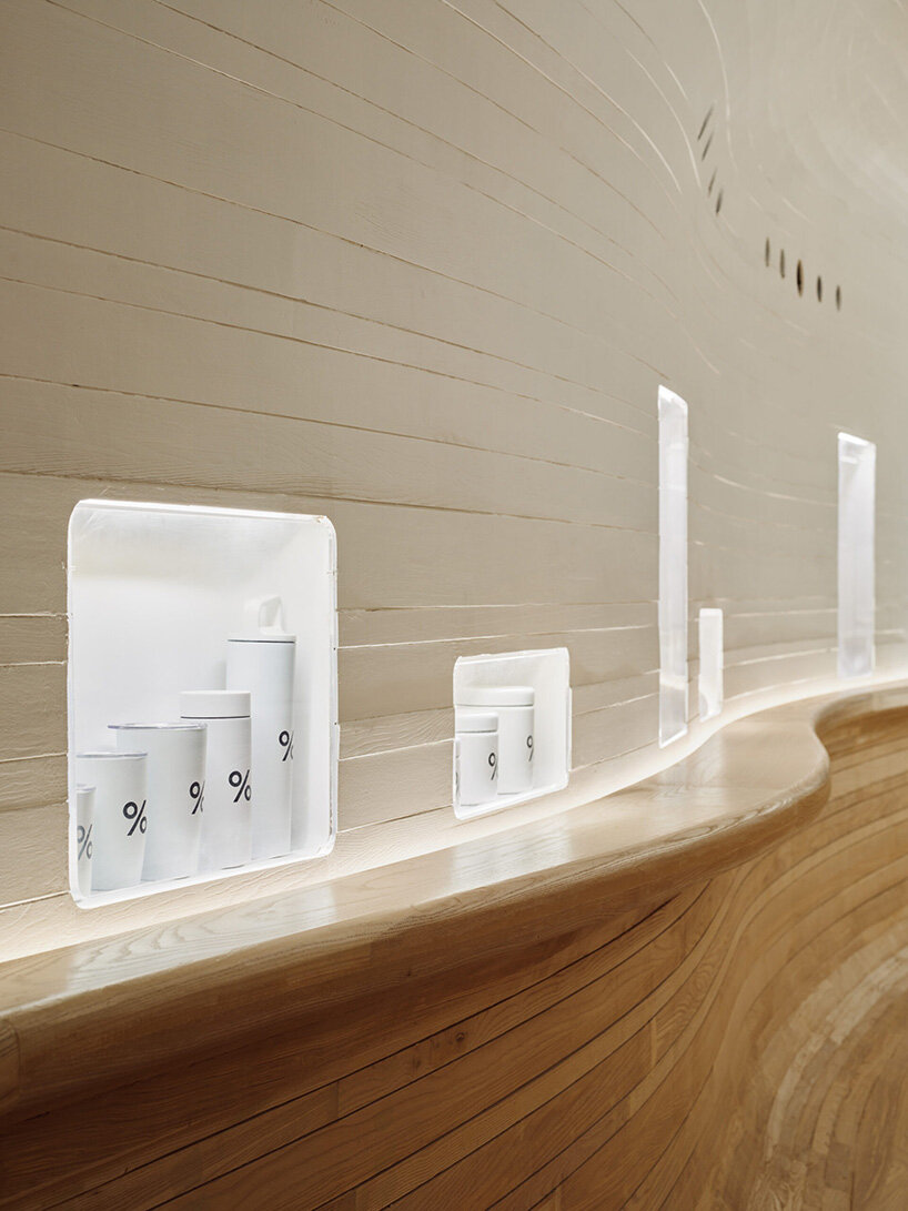 selgascano and curtis su envelop % arabica new york café in handcrafted timber cocoon