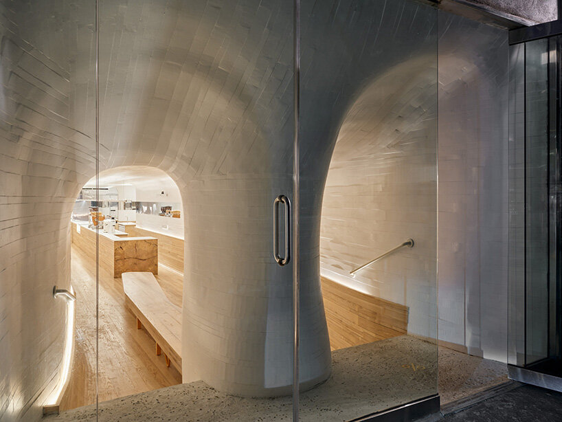 selgascano and curtis su envelop % arabica new york café in handcrafted timber cocoon