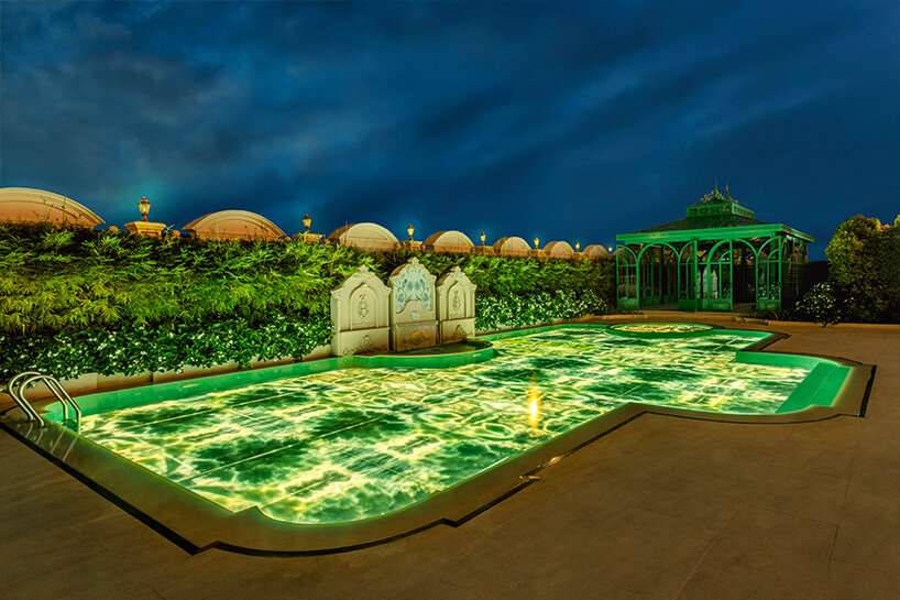 SICIS creates glowing swimming pool surface with decorative glass for cambodian villa