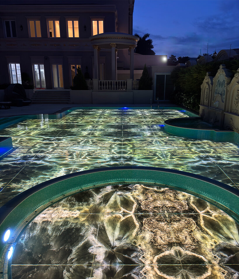 SICIS creates glowing swimming pool surface with decorative glass for cambodian villa