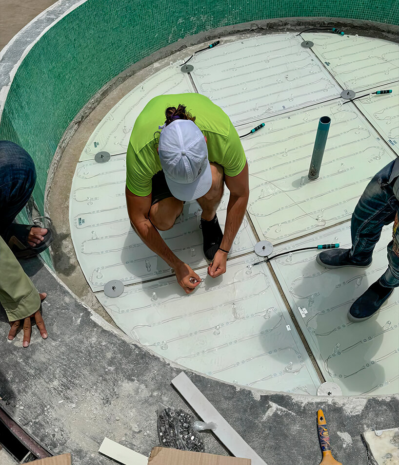 SICIS creates glowing swimming pool surface with decorative glass for cambodian villa