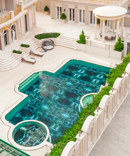 SICIS creates glowing swimming pool surface with decorative glass for cambodian villa