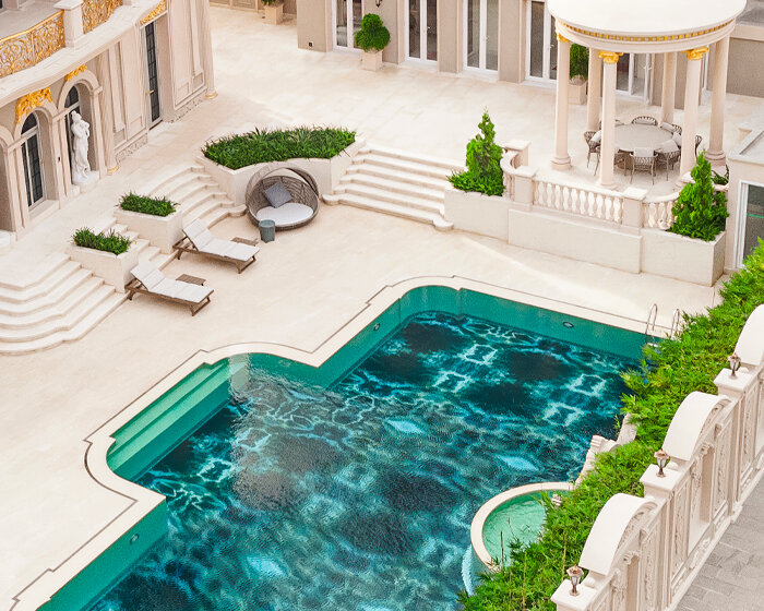 SICIS creates glowing swimming pool surface with decorative glass for cambodian villa
