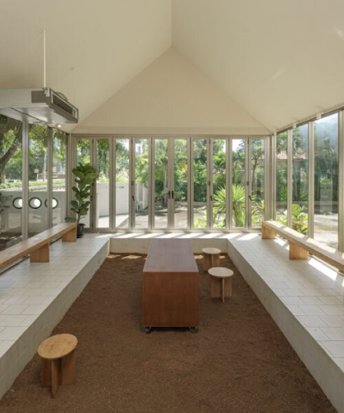 coffee beans cover sunken seating area in single origin chiangmai roastery by flat12x