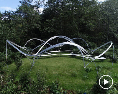 slender steel arcs blossom into kong xiangwei studio's camellia-like theater in china