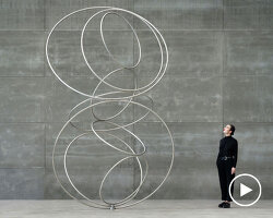 nine steel rings continuously rotate in cycles for SpY's form-bending kinetic sculpture