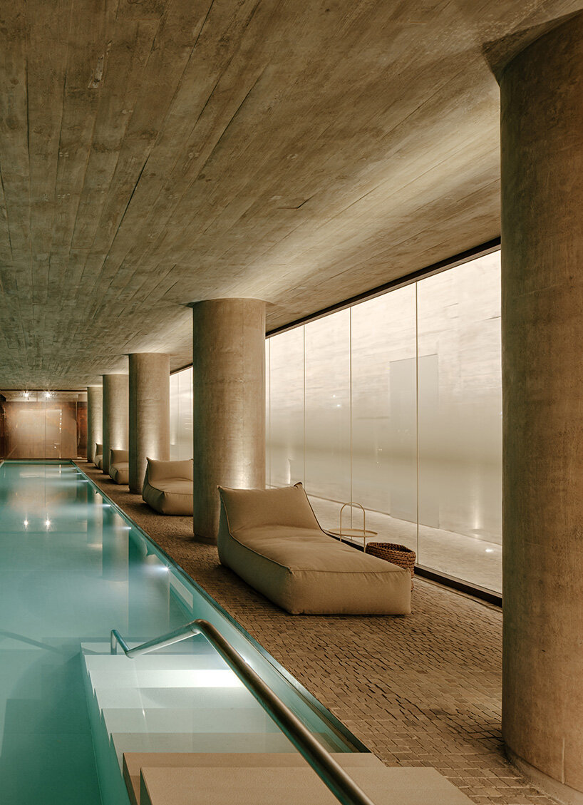 studio arthur casas wraps ribbed concrete tower with vertical gardens in são paulo