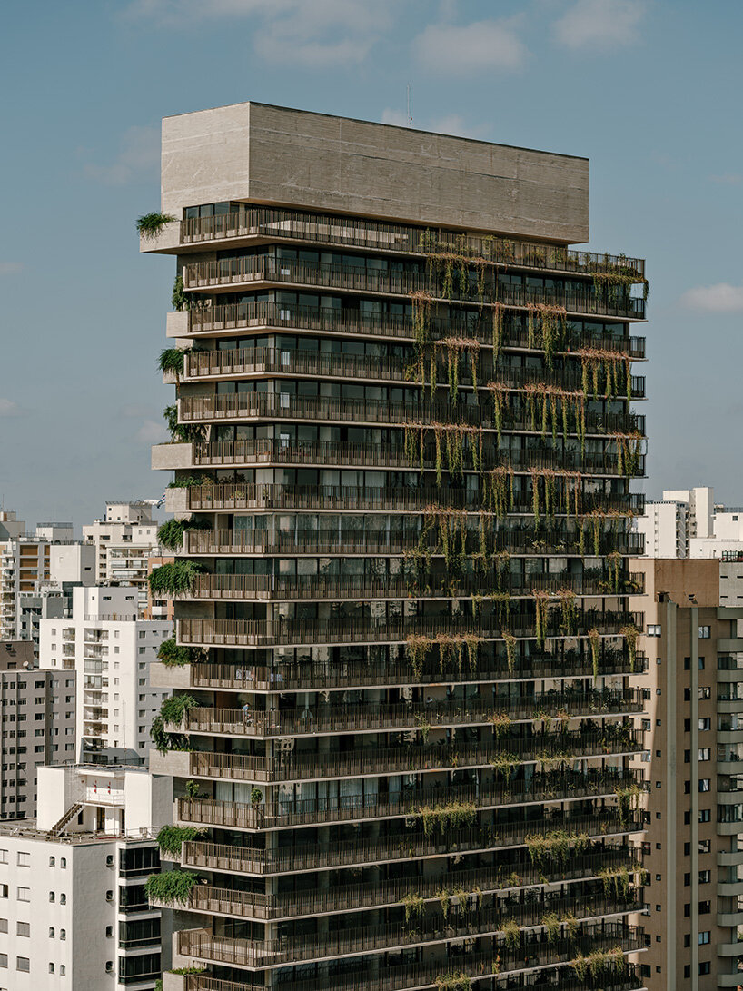 studio arthur casas wraps ribbed concrete tower with vertical gardens in são paulo
