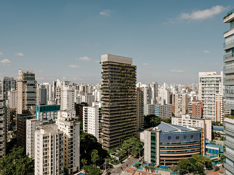studio arthur casas wraps ribbed concrete tower with vertical gardens in são paulo