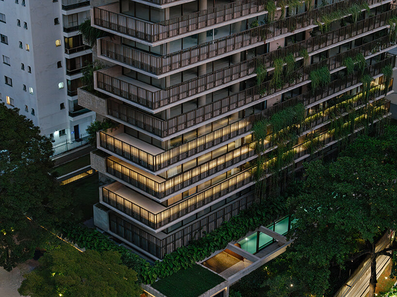 studio arthur casas wraps ribbed concrete tower with vertical gardens in são paulo
