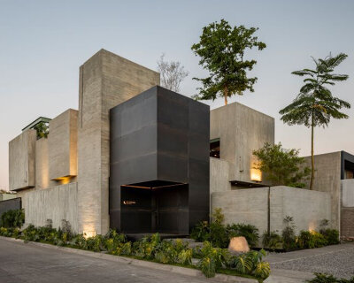 assemblage of concrete, stone, and steel blocks shape di frenna arquitectos' mexico office