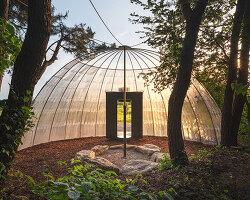 one-aftr frames urban stillness with suspended mesh 'open hut' in south korea