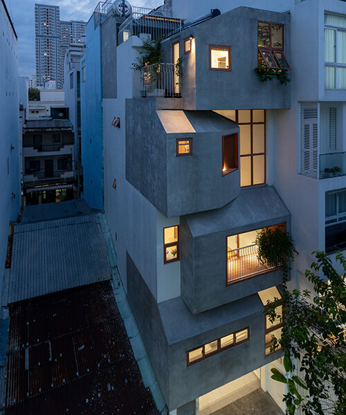 vietnam architects fill a narrow plot with stacked volumes to shape 'titi’s house'