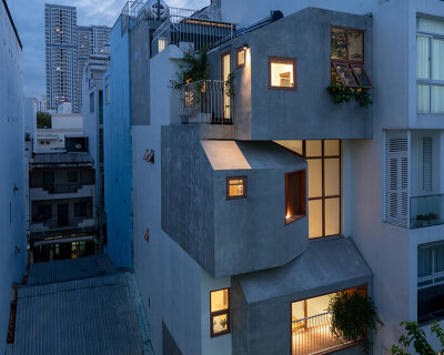 vietnam architects fill a narrow plot with stacked volumes to shape 'titi’s house'