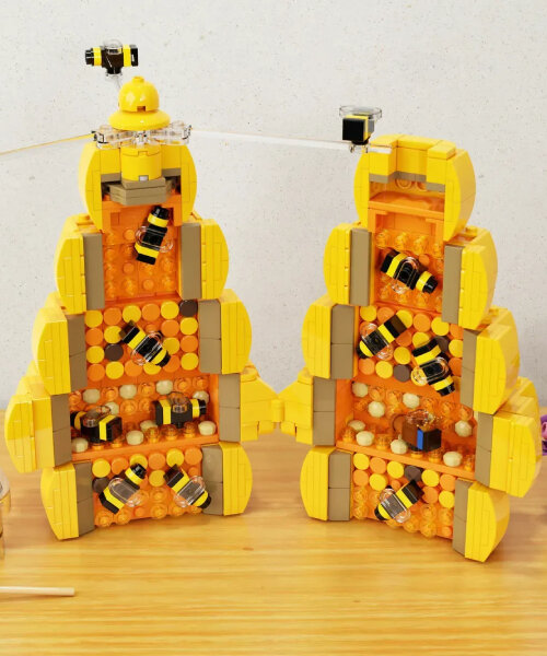 tower-like hive made of LEGO bricks unfolds to reveal the bees working inside
