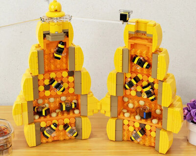 tower-like hive made of LEGO bricks unfolds to reveal the bees working inside