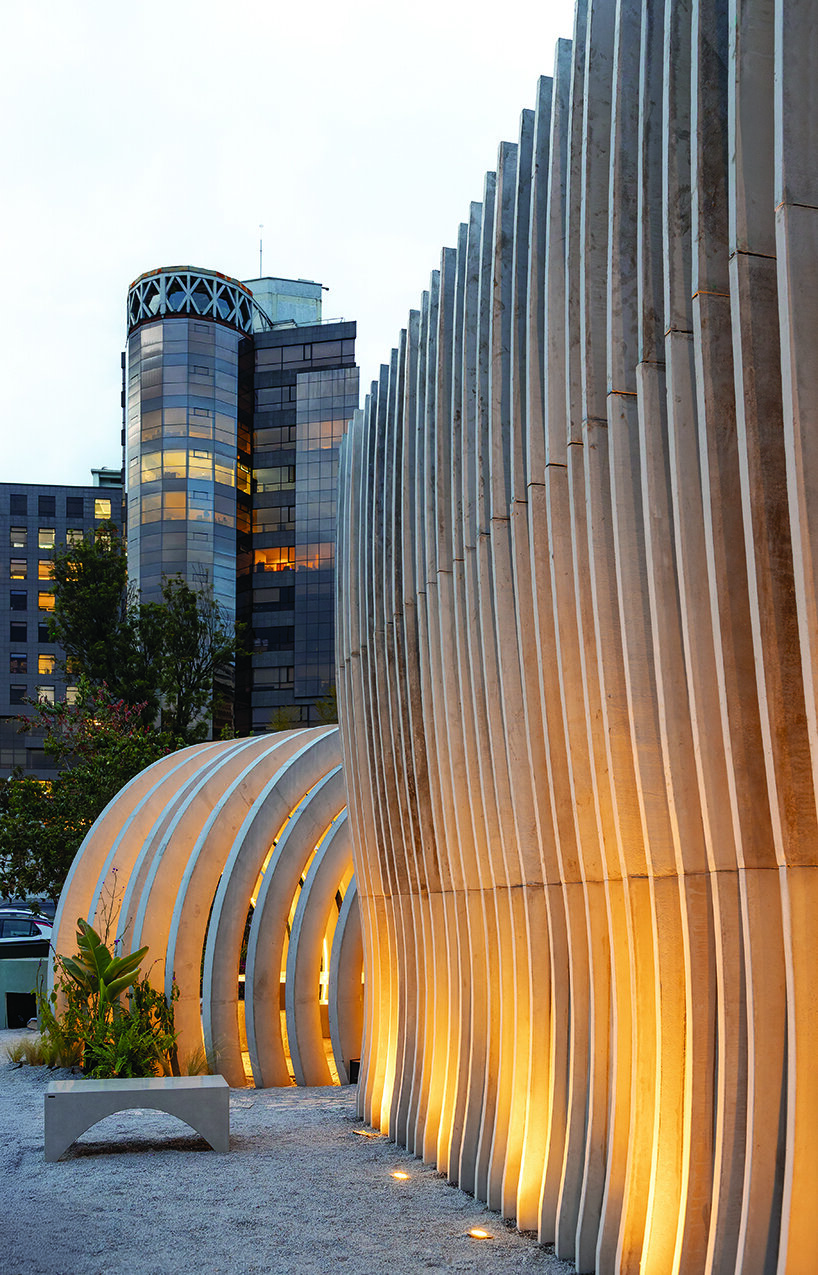 jgstudio transforms public bathroom into undulating concrete installation in ecuador
