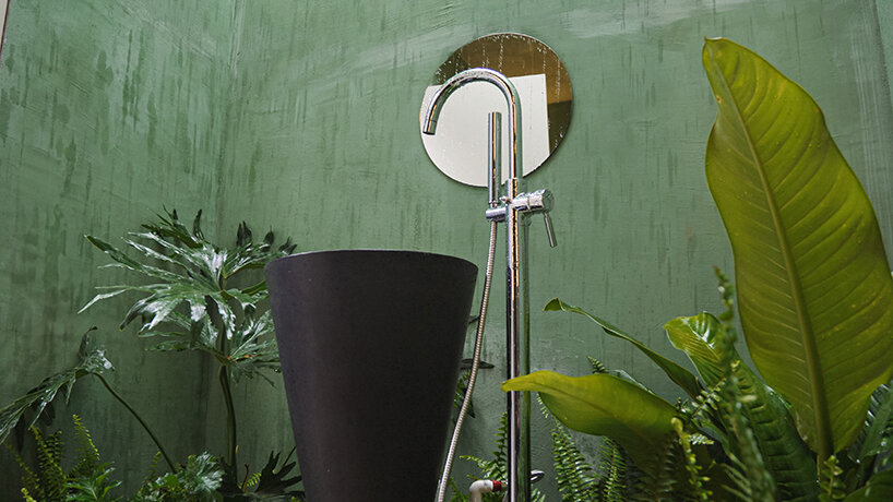 jgstudio transforms public bathroom into undulating concrete installation in ecuador