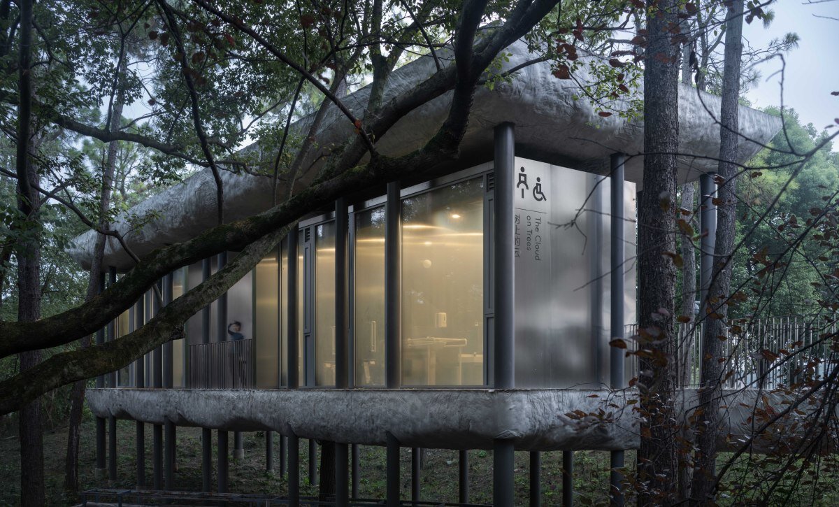 WUWU atelier's restrooms perch like concrete clouds and cavernous crevices in china forest