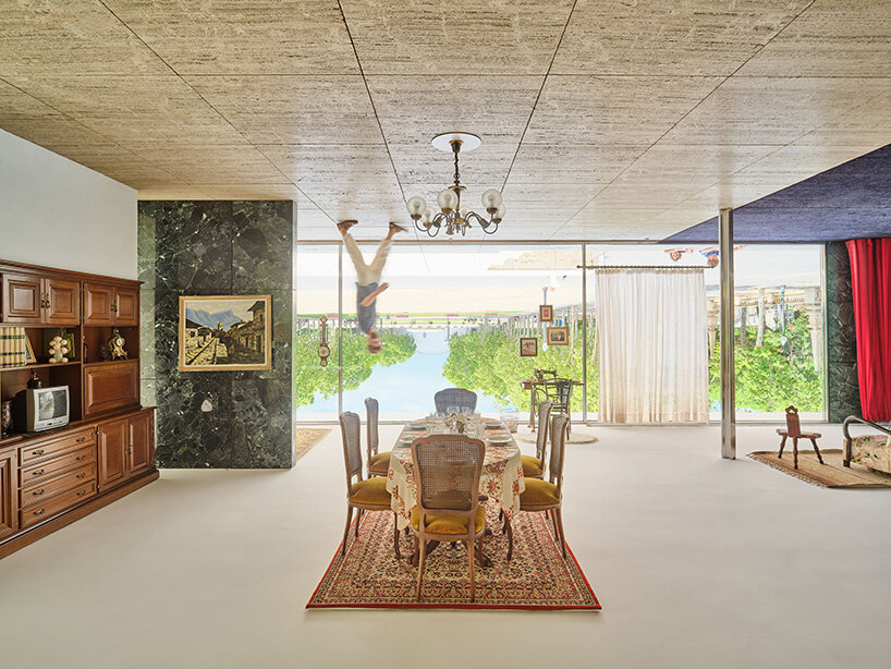 xevi bayona flips mies van der rohe's barcelona pavilion with ceiling-bound household relics