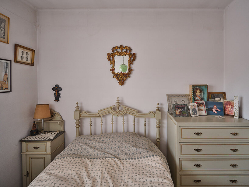 xevi bayona flips mies van der rohe's barcelona pavilion with ceiling-bound household relics