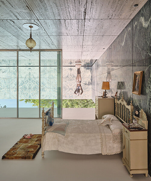 xevi bayona flips mies van der rohe's barcelona pavilion with ceiling-bound household relics
