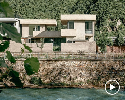 riverside house's geometric concrete volumes by xiān architects pop up in rural beijing
