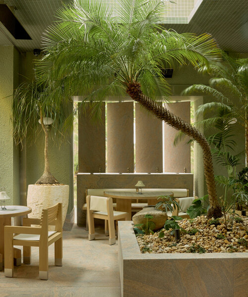 J.AR office brings brutalist garden restaurant with green-tiled surfaces to brisbane