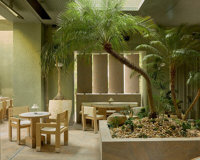 J.AR office brings brutalist garden restaurant with green-tiled surfaces to brisbane