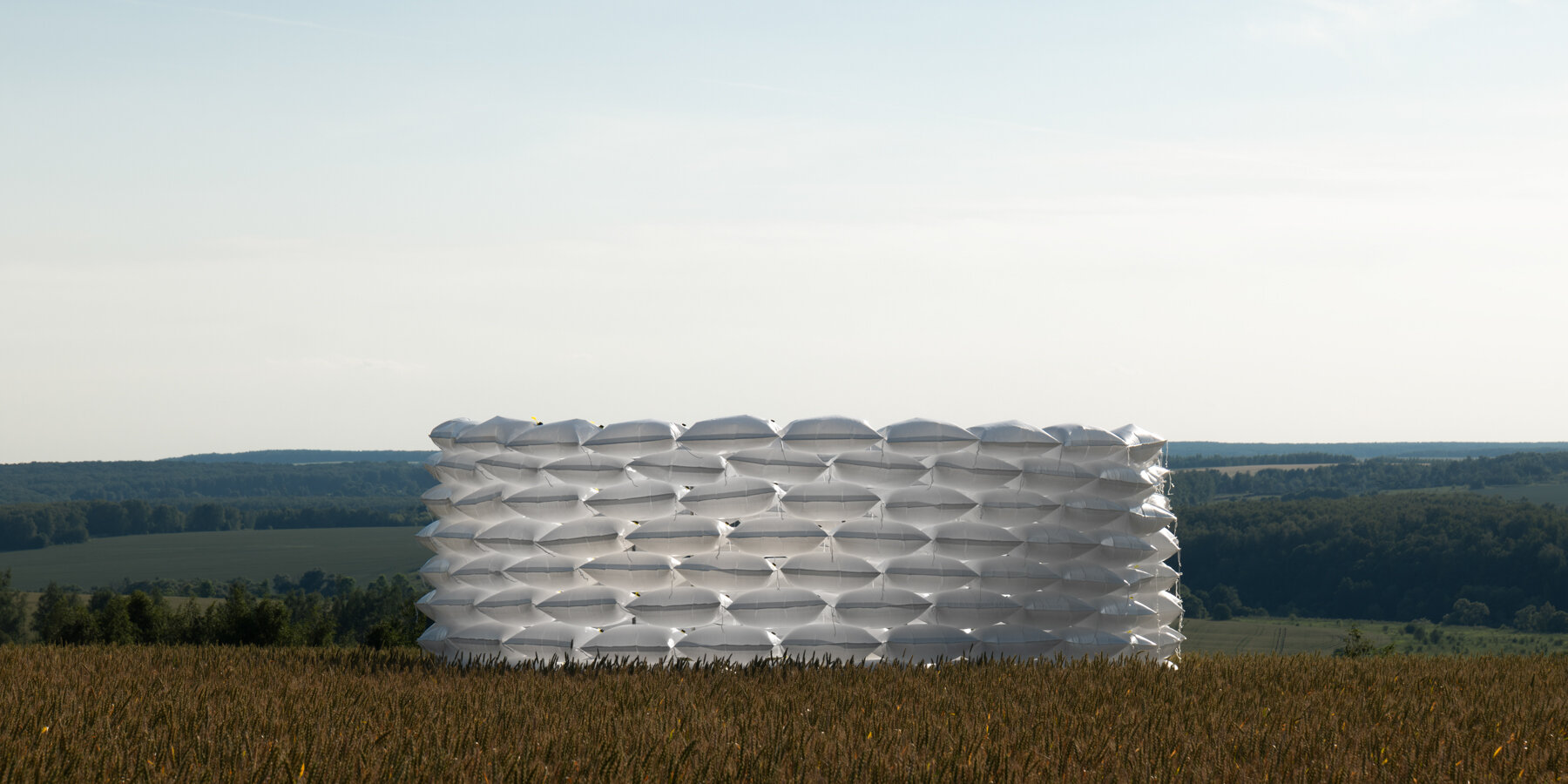 air-filled-sandbag-installation-gregory-orekhov-soft-circular-barricade-france-softpower-designboom-1800-2