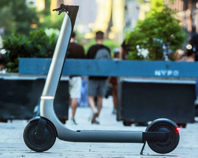 bo M electric scooter can climb hills and has lights that adjust to temperature changes