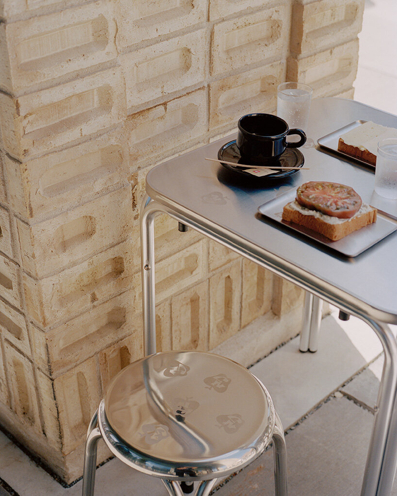 café by kim lenschow and NIKO JUNE doubles as design shop on copenhagen's waterfront