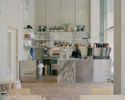 café by kim lenschow and NIKO JUNE doubles as design shop on copenhagen's waterfront