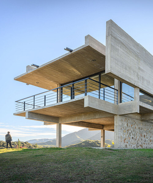 cristian nanzer’s house on el dragón rises from cyclopean stone base in argentina