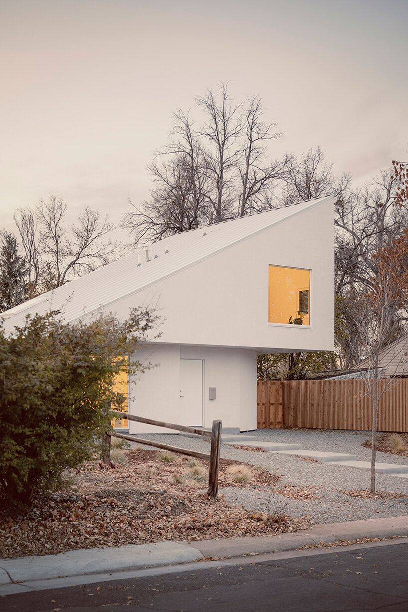 circular ground floor supports shed-roofed volume in NEMESTUDIO's colorado dwelling
