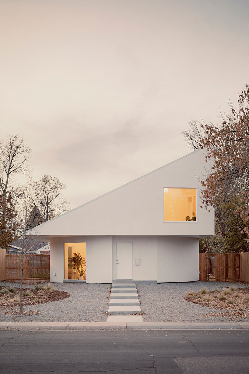 circular ground floor supports shed-roofed volume in NEMESTUDIO's colorado dwelling