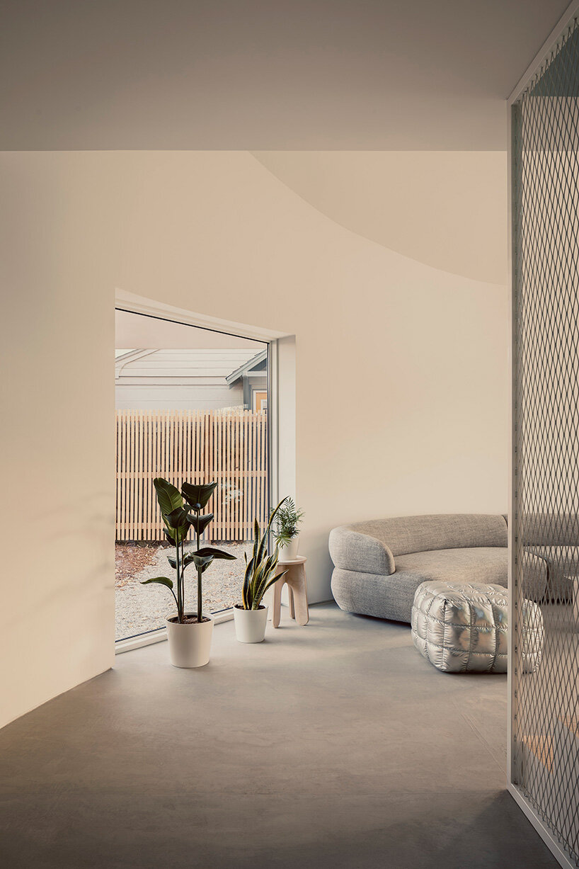 circular ground floor supports shed-roofed volume in NEMESTUDIO's colorado dwelling