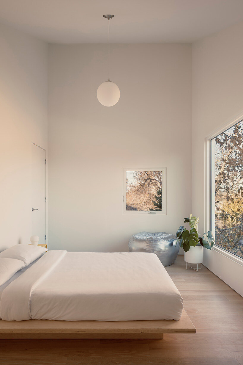 circular ground floor supports shed-roofed volume in NEMESTUDIO's colorado dwelling