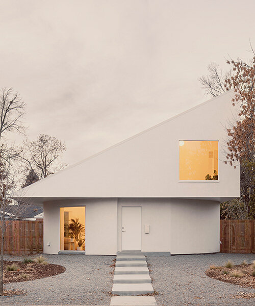 circular ground floor supports shed-roofed volume in NEMESTUDIO's colorado dwelling