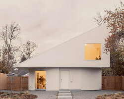 circular ground floor supports shed-roofed volume in NEMESTUDIO's colorado dwelling