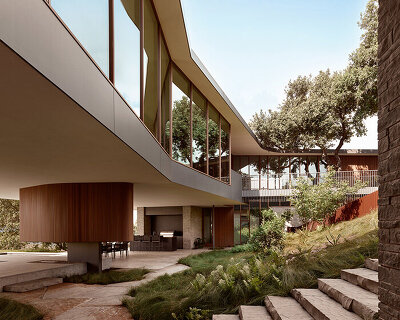 alterstudio's net-positive 'city park residence' bridges sloping site in austin, texas