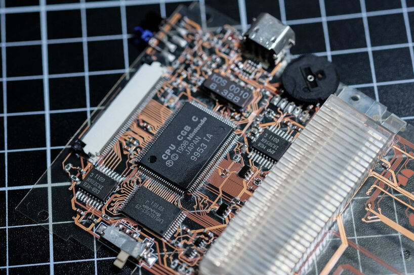 the network of copper wires seem to float because of the transaprent circuit board